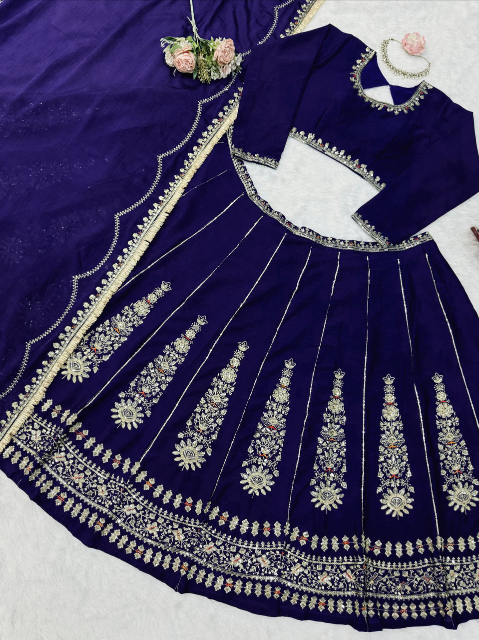Radiant Rani Pink Silk Lehenga Choli Adorned with Opulent Heritage Floral Motifs and Intricate Zari Borders